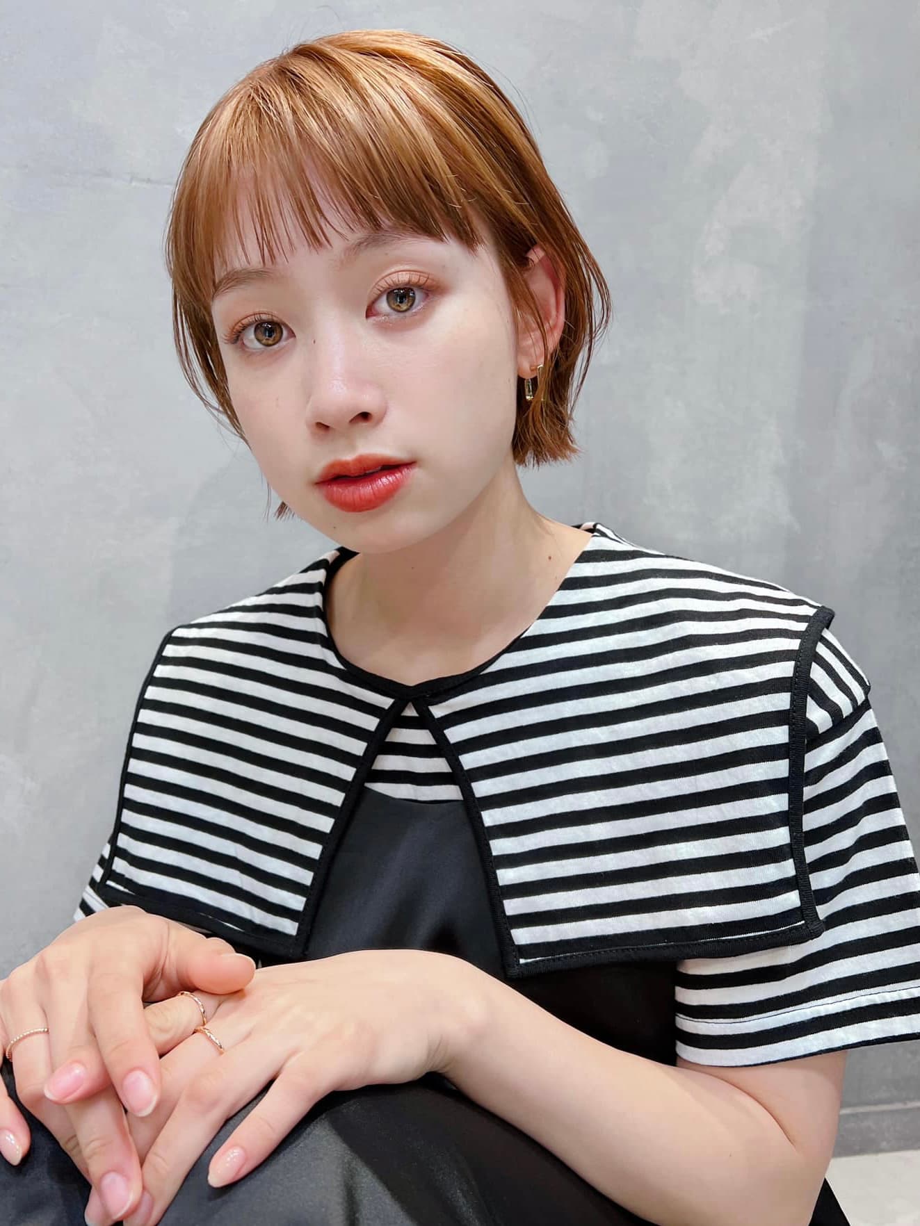杏橙色的蓬松前髪短波波头
